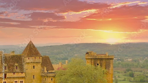 Sunset panorama in Castle of Castelnau-Bretenoux. It is located on the top of a hill, at the intersection of several valleys; among them is the Dordogne River. Lot department in southern France. photo