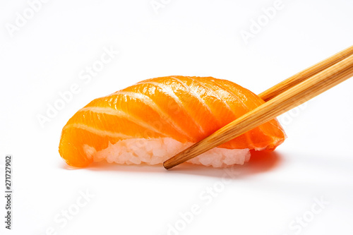 Sashimi, Salmon, Japanese food chopsticks and wasabi with withe plate isolated