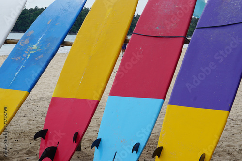 surfboards on the beach for rent