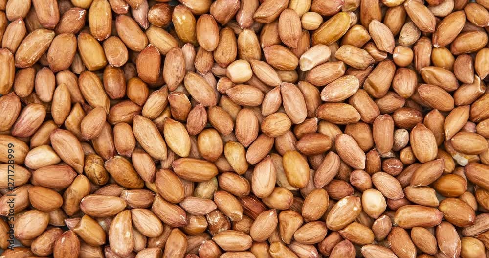 Close up of unpeeled peanuts. Food background Close up of unpeeled peanuts. Food background