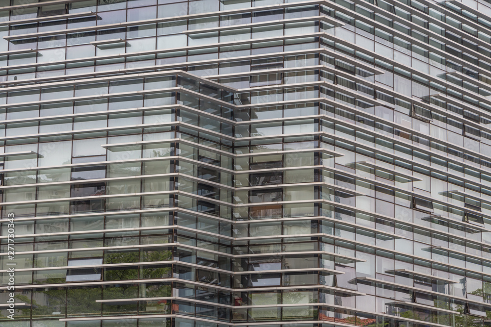 Glass facade structure of modern urban financial and commercial office buildings Glass facade structure of modern urban financial and commercial office buildings