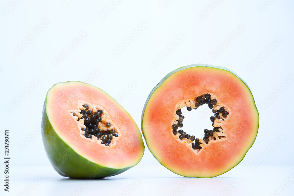 Slices of papaya on white background Slices of papaya on white background