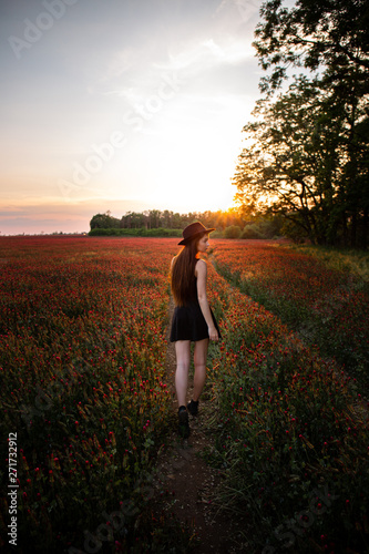 Walking girl at the sunset