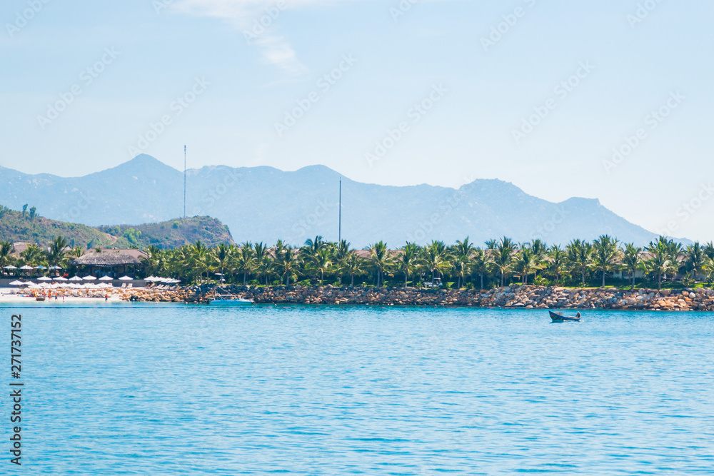 landscape, view from the sea, white beach, palm trees, mountains, boat, plane in the sky, Vietnam. five star hotel. landscape, view from the sea, white beach, palm trees, mountains, boat, plane in the sky, Vietnam. five star hotel.