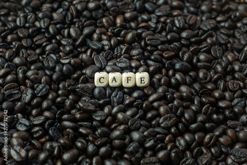  coffee roasted and text wood cube close up image.