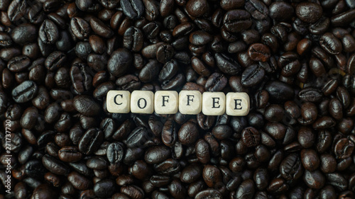  coffee roasted and text wood cube close up image.