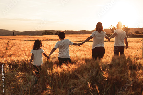 Happy and fun family in nature. Concept of united family having fun and smiling
