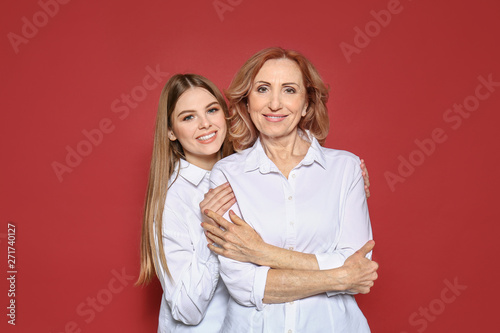 Portrait of happy mother wi...