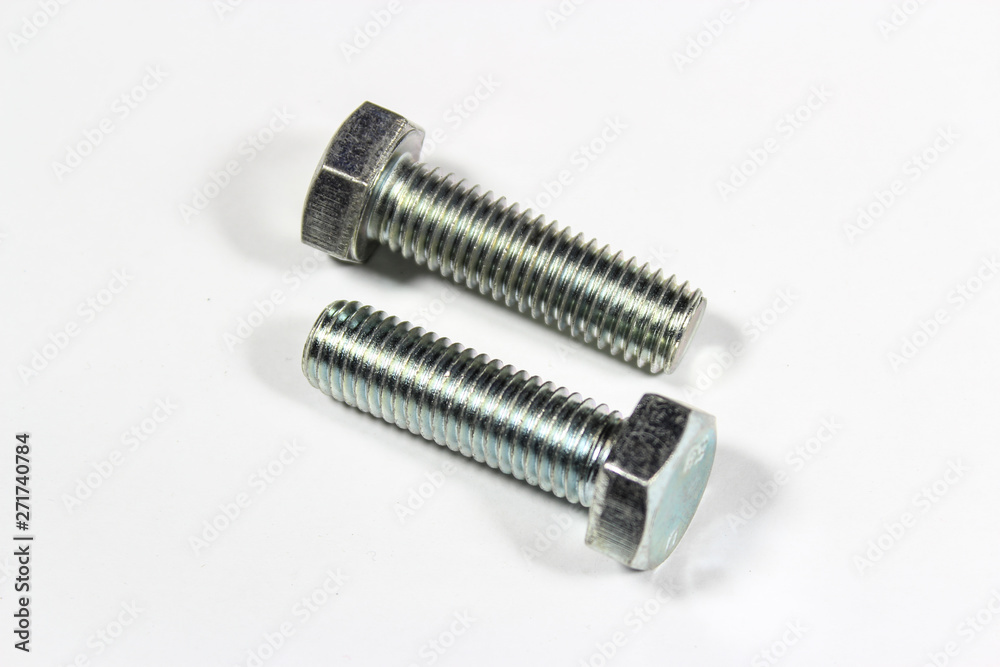 Steel metallic bolts on a white isolated background Steel metallic bolts on a white isolated background