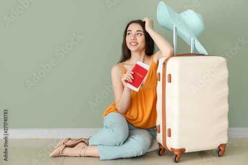 Happy young woman with suit...