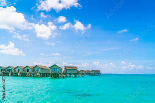 Beautiful water villas in tropical Maldives island  . © jannoon028