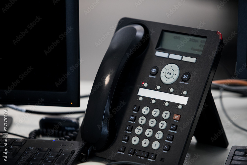 close up soft focus on telephone devices at office desk. close up soft focus on telephone devices at office desk.