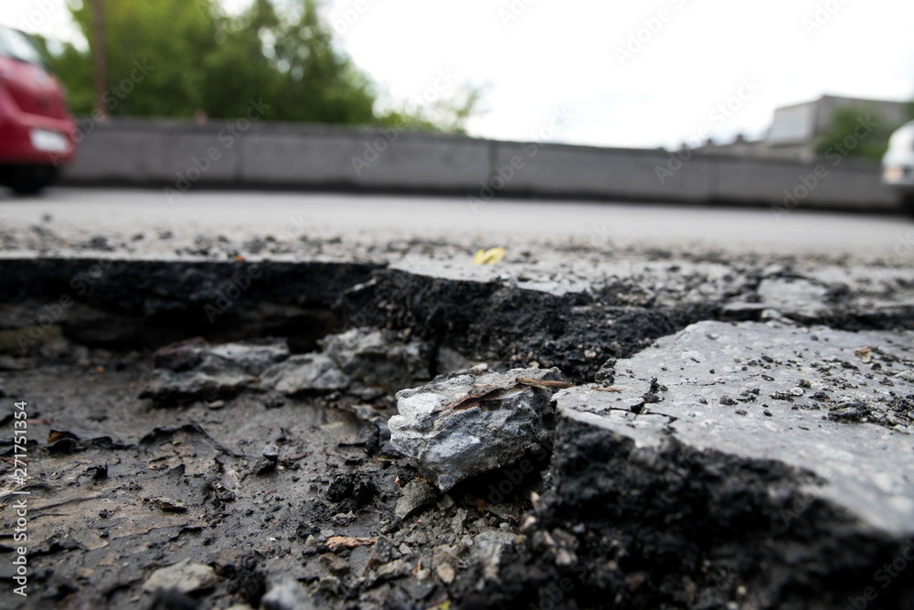 Cracked surface of an asphalt road Cracked surface of an asphalt road