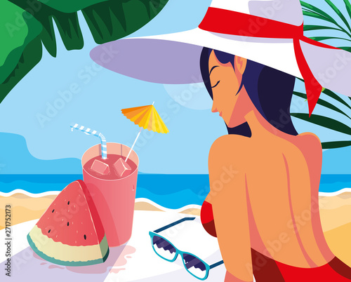 woman with cocktails in the beach
