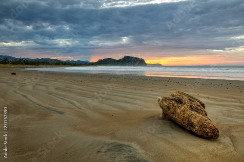 A nice and quiet sand beach at sunrise,Pacific coast, Nicoya peninsula, Costa rica
