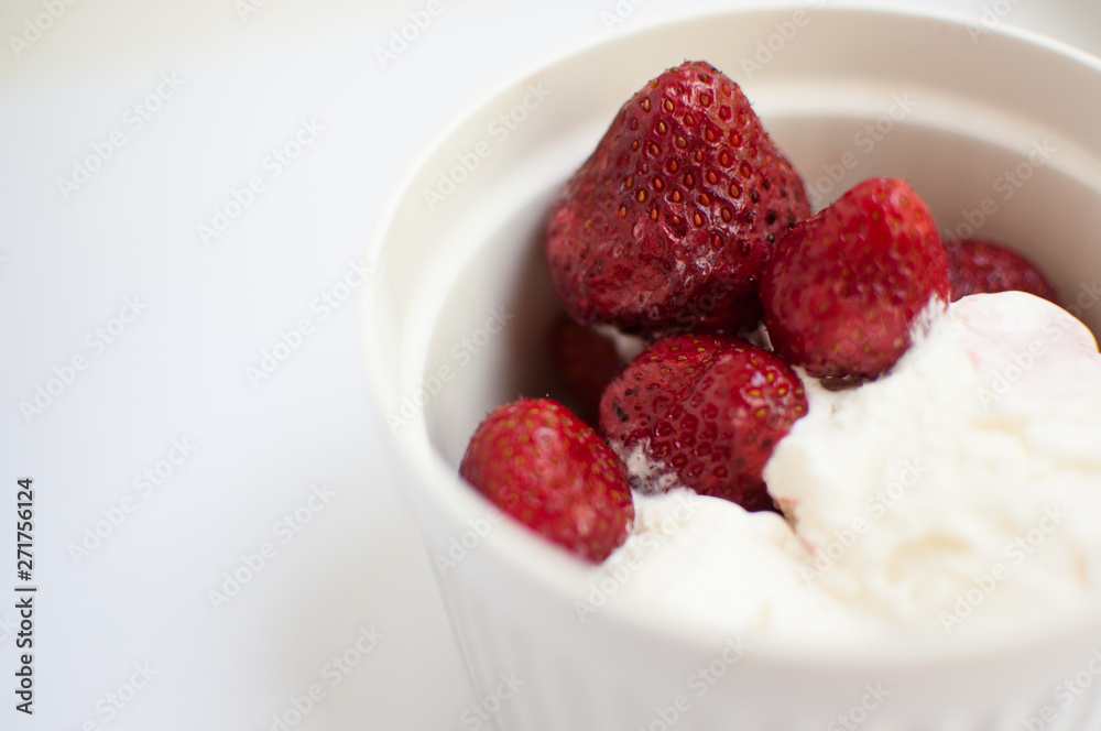 strawberries with ice cream in sundae strawberries with ice cream in sundae