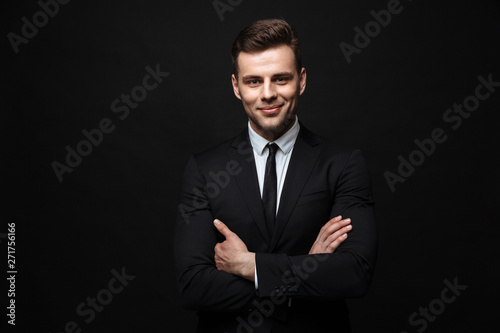 Handsome confident businessman wearing suit