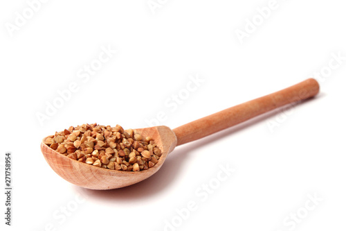 raw buckwheat isolated on white.