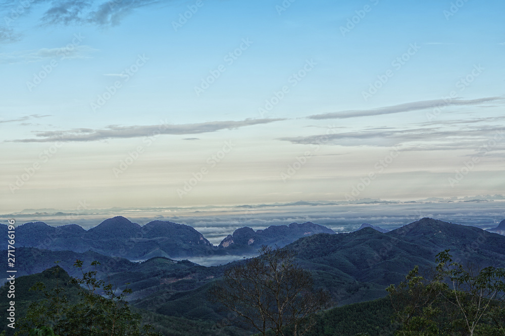 Sea of the mist with blue sky on mountain at morning sunrise winter season background Sea of the mist with blue sky on mountain at morning sunrise winter season background