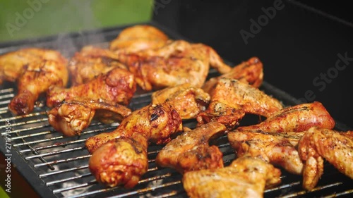 Wallpaper Mural Delicious chicken pieces frying on barbecue grill Torontodigital.ca