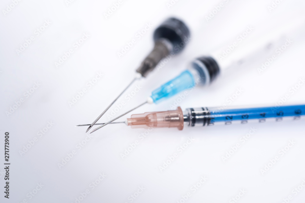 Vaccination time. Vaccine in vial with syringe on clock background. Prevention immunization illness. Vaccination time. Vaccine in vial with syringe on clock background. Prevention immunization illness.