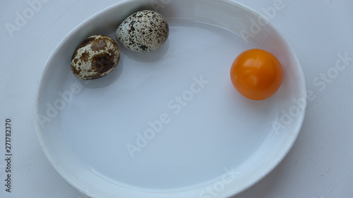 quail eggs, yolk, tomato, photo