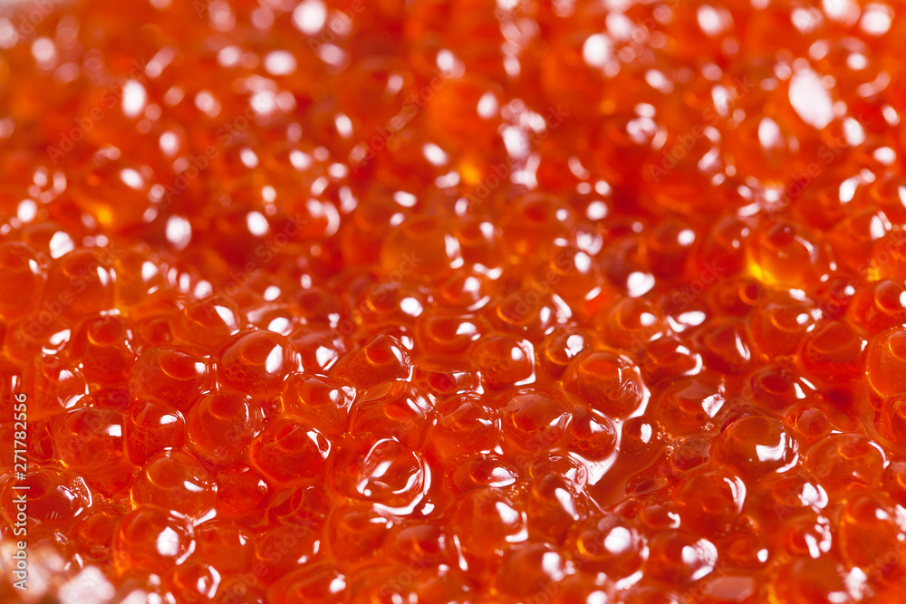 Fresh red caviar macro background Fresh red caviar macro background