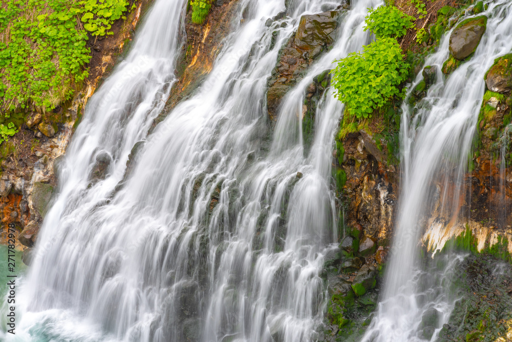 Shirahige-no-taki Waterfalls and the Tokachi river in Biei, Hokkaido, Japan