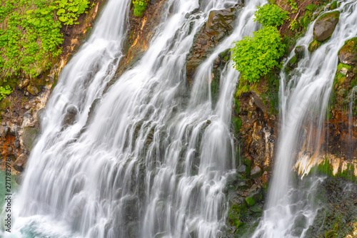 Shirahige-no-taki Waterfalls and the Tokachi river in Biei  Hokkaido  Japan