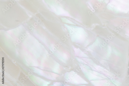 Abstract pearl background with soft shimmering mother of pearl lilac and rainbow colours photo