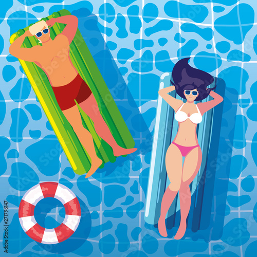 couple tanning in float on the pool