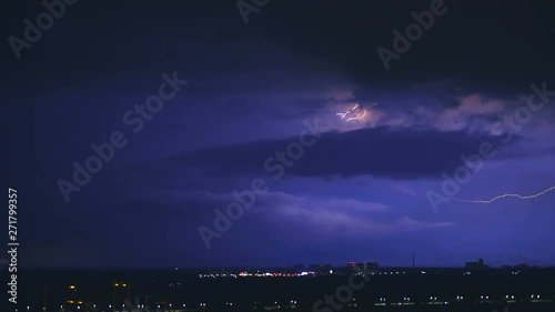 The bright lightning above the night city