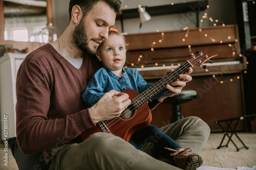 A man is teaching a little ...