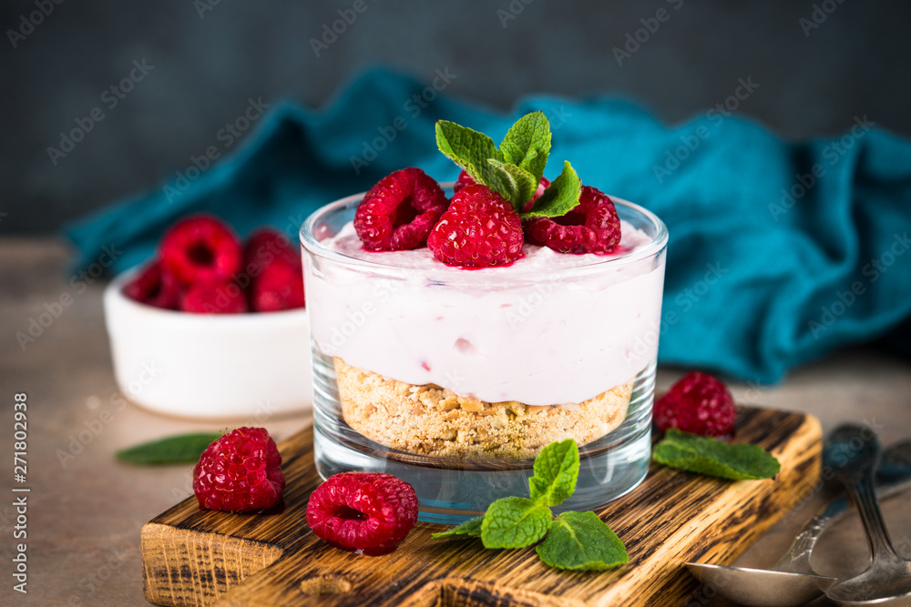 No baked cheesecake with raspberry in glass jar. No baked cheesecake with raspberry in glass jar.
