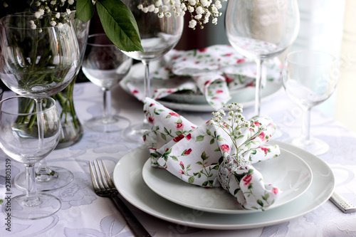Beautiful holiday table setting with flowers