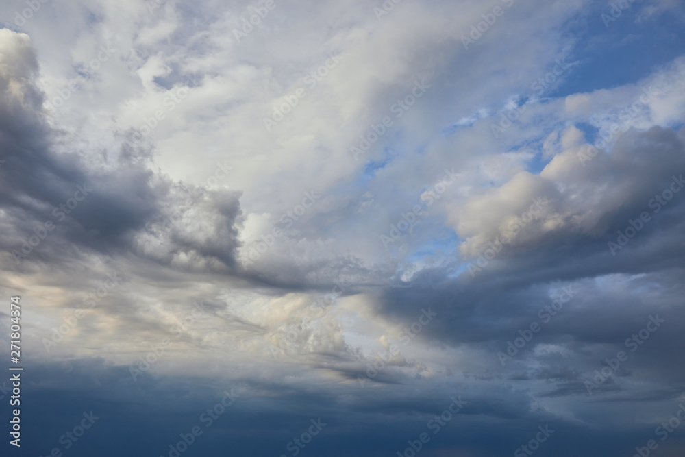 view of peaceful grey sky background with white and dark clouds