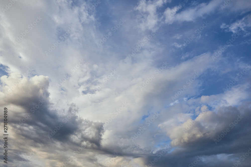 view of grey and white clouds on blue sky background