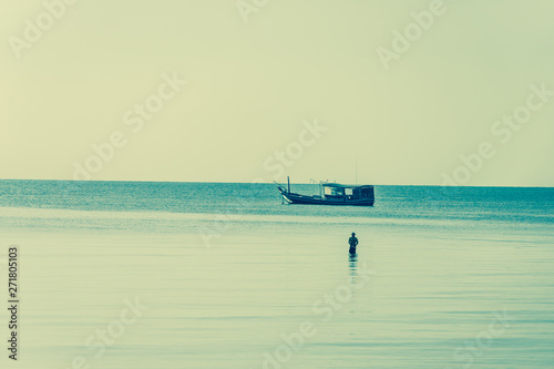 Fototapeta Naklejka Na Ścianę i Meble -  Folk fishing boat Morning coast