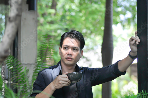 a man is drinking coffee