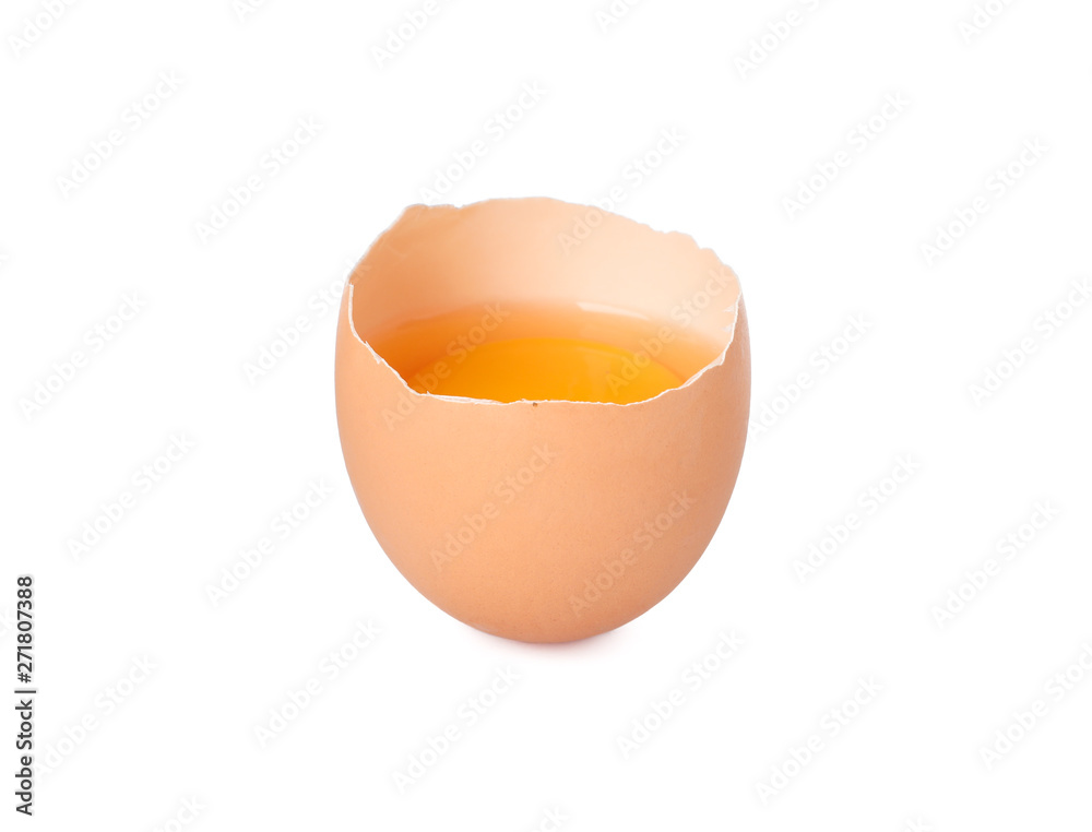 Half broken egg with yolk isolated on white background Half broken egg with yolk isolated on white background