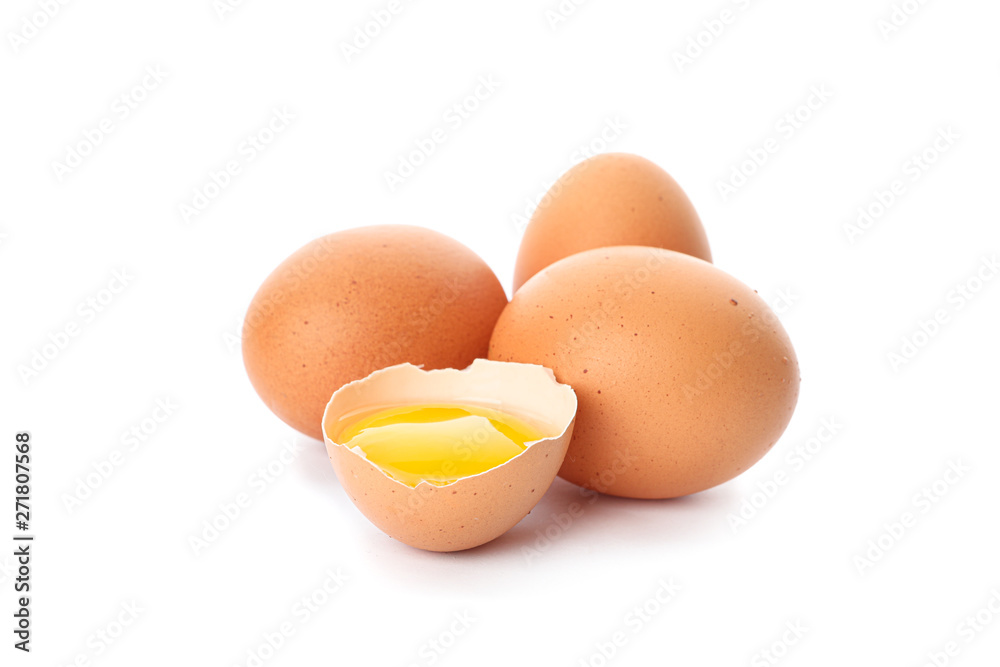 Chicken eggs and half broken egg with yolk isolated on white background Chicken eggs and half broken egg with yolk isolated on white background