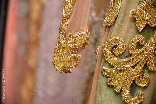 detail of embroidery in party dress