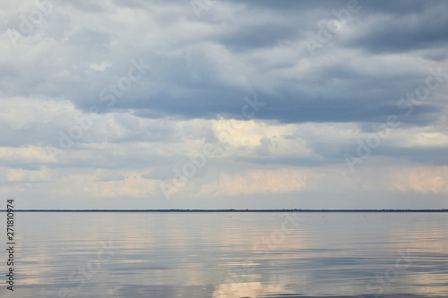 River over blue and peaceful sky with white clouds © LIGHTFIELD STUDIOS