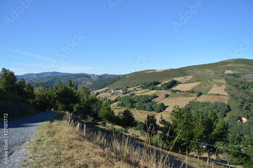 Road Next To The Mountains Of Galicia Fills Of Valleys Forests Of Pines Meadows And Forests Of Eucalyptus In Rebedul. August 3, 2013. Rebedul, Lugo, Galicia, Spain. Rural Tourism, Nature. photo