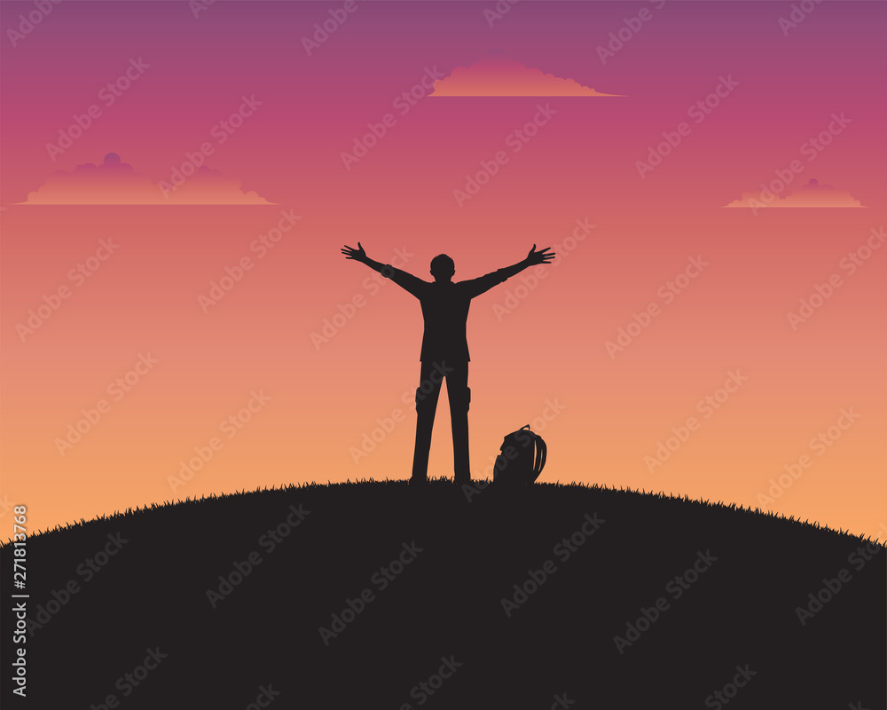 Silhouette happy a man of sunset background