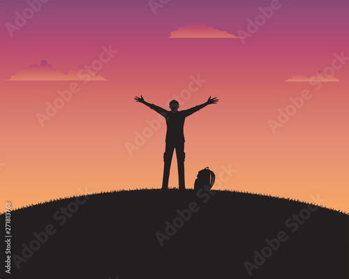 Silhouette happy a man of sunset background