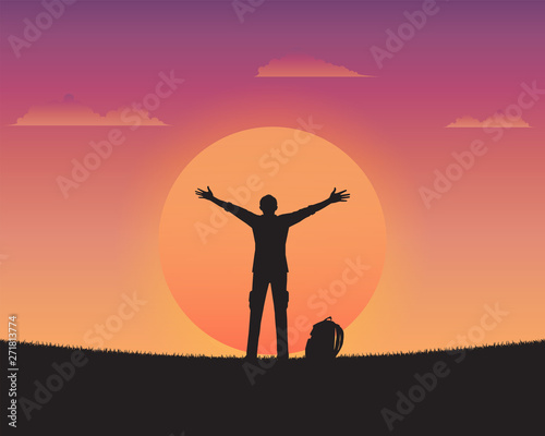 Silhouette happy a man of sunset background