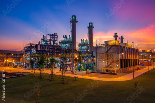Electric plant turbine generator in the power supply plant in the industry area during twilight time photo