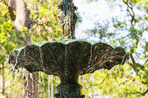 Mobile, USA Old town Bienville square park in Alabama famous southern town and closeup of water fountain spraying splashing photo