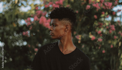 selective focus photography of man in black shirt